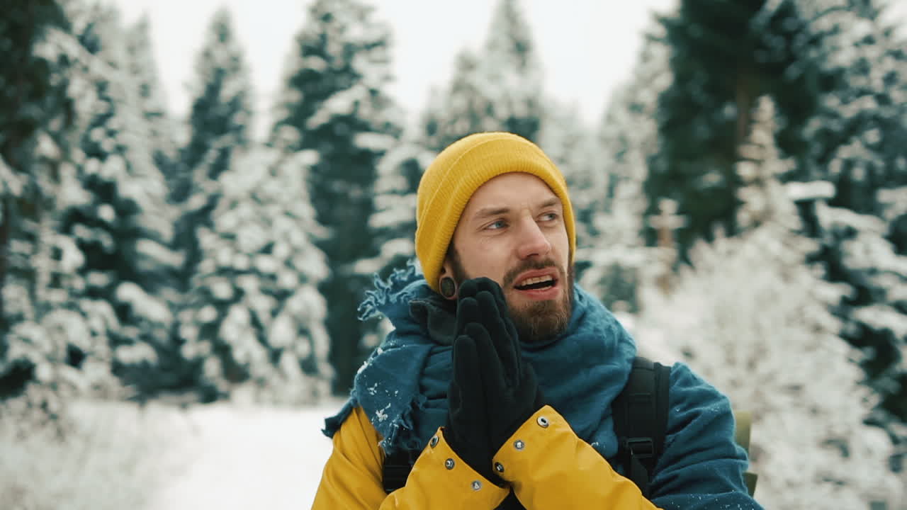 Man in winter forest