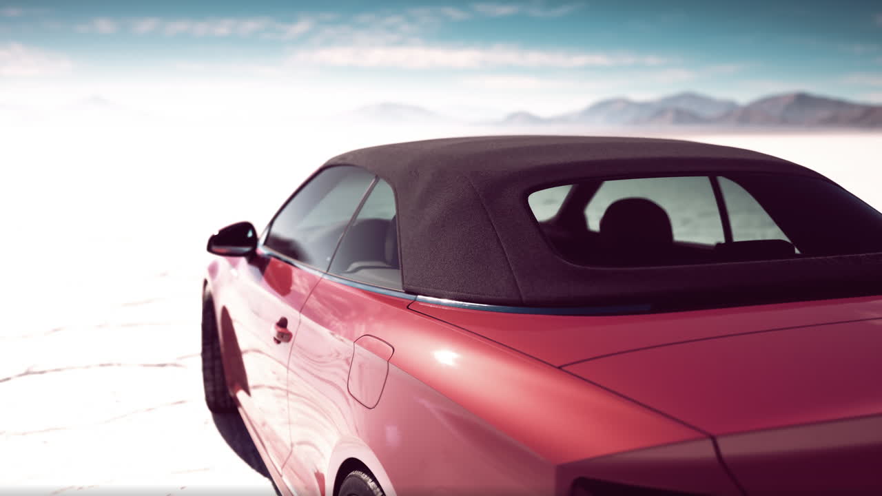 coche descapotable rojo en el paisaje del desierto