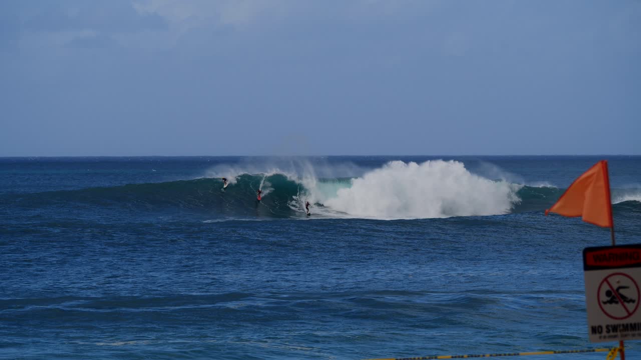 Big Wave Surfing at Waimea Bay Hawaii