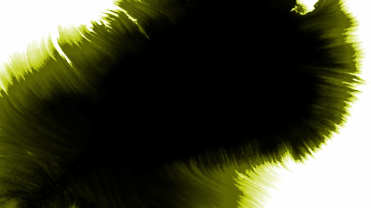 salpicaduras y manchas de tinta amarilla que se extienden sobre un fondo blanco