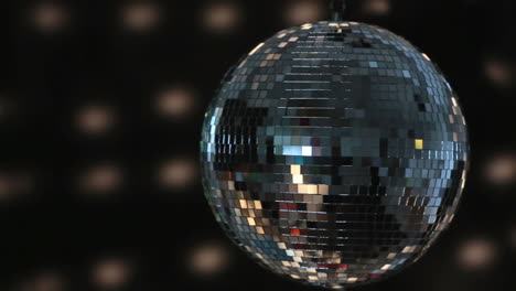 shiny disco ball spinning around