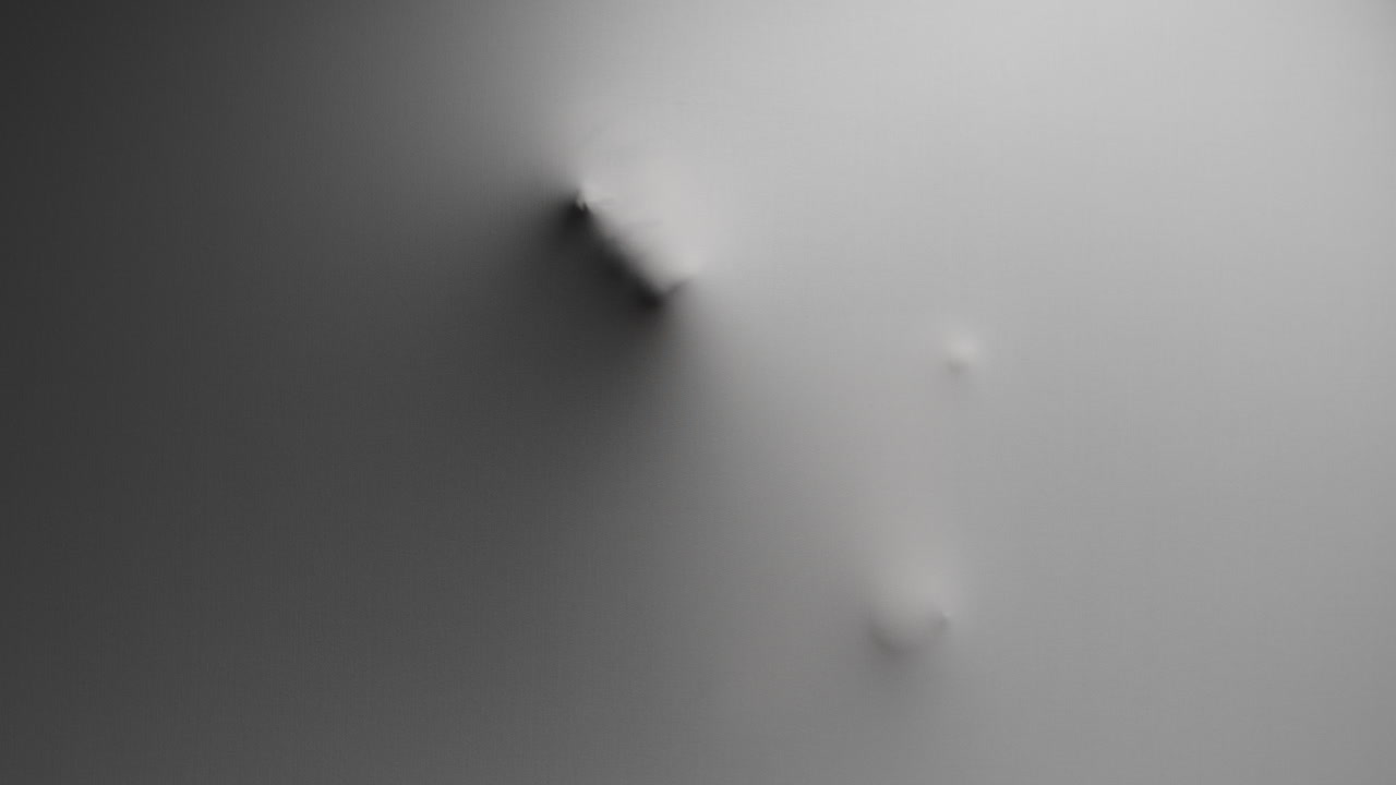 A scary silhouette of a woman appears from the wall