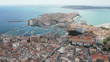 panorama of syracuse city, ortigia island, and the ionian sea at daytime in sicily, italy