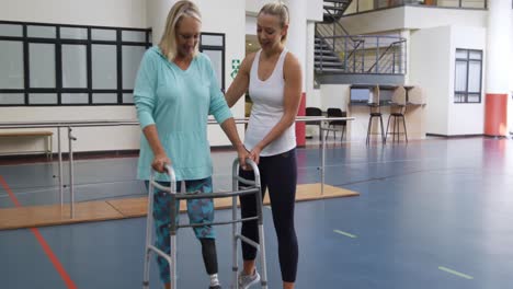 woman exercising with a prosthetic leg