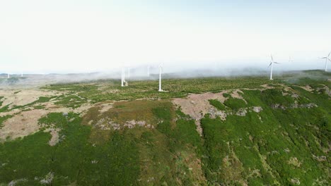 Pedras-Wind-Farm---Wind-Turbines-With-Misty-Background-In-Lombo-do-Mouro-Viewpoint,-Serra-de-Agua,-Portugal