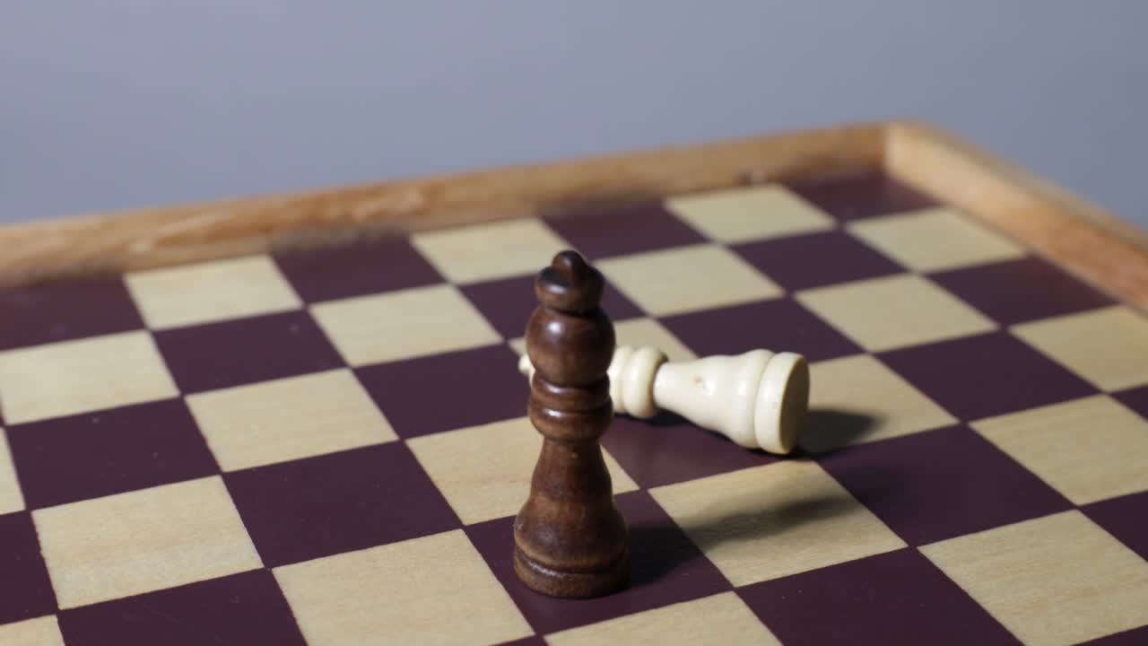 Cinematic shot of chessboard with queens