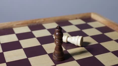 cinematic shot of chessboard with queens
