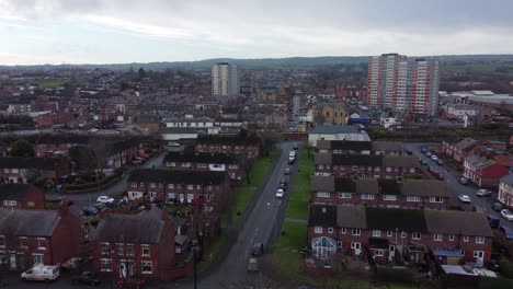 aerial above welsh flint overlooking housing estate north wales town property