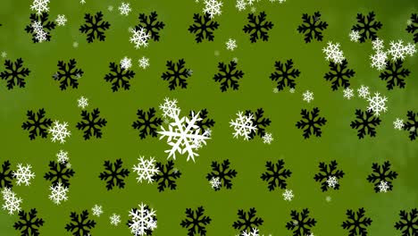 animación de copos de nieve que caen sobre un fondo verde