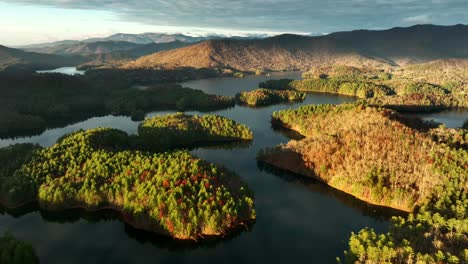 Reflections-of-Lake-Santeetlah,-North-Carolina-during-golden-hour