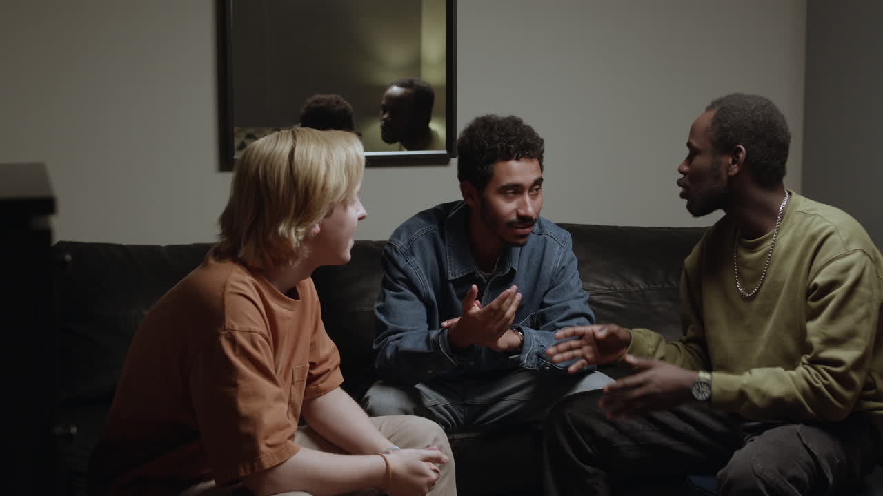 Meeting of male friends in an apartment