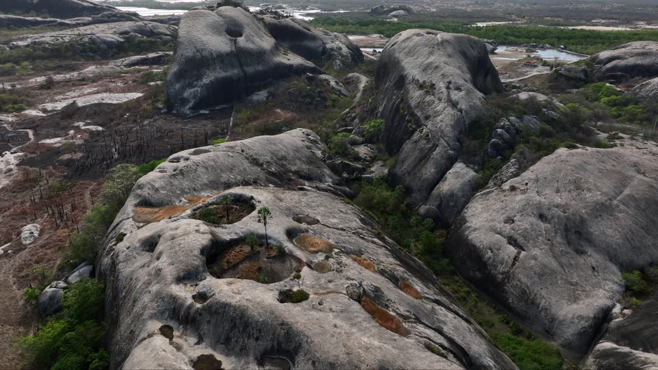 Aerial View of Granite Rock Formation with Eroded Panholes in Brazil