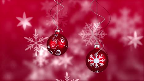 Animation-of-falling-snow-and-christmas-decorations-over-red-background