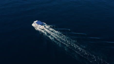 Small-Motor-Fishing-Boat-Leaving-Wake-On-A-Calm-Sea-Of-Adriatic-In-Croatia
