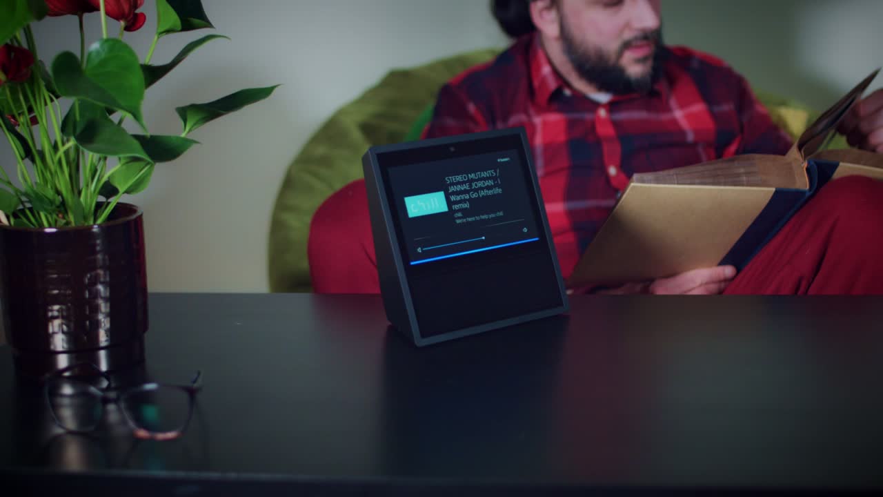 4k Young Man Asking Smart Home Device to Put Music On