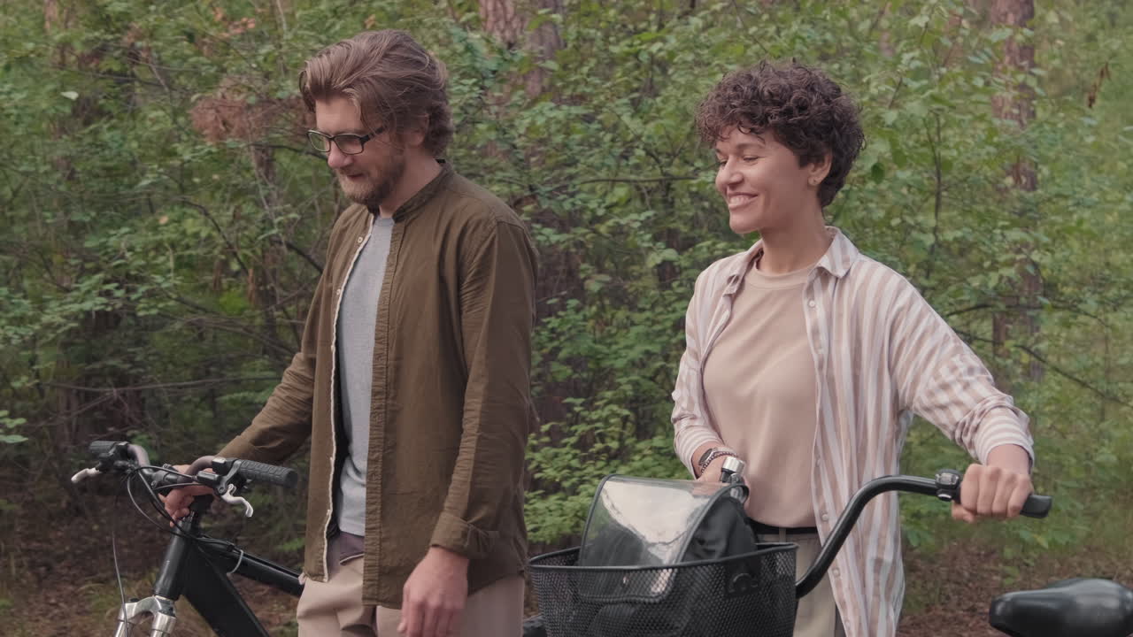 Caucasian Couple On Walk With Bikes