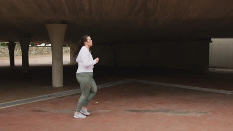 young caucasian woman running