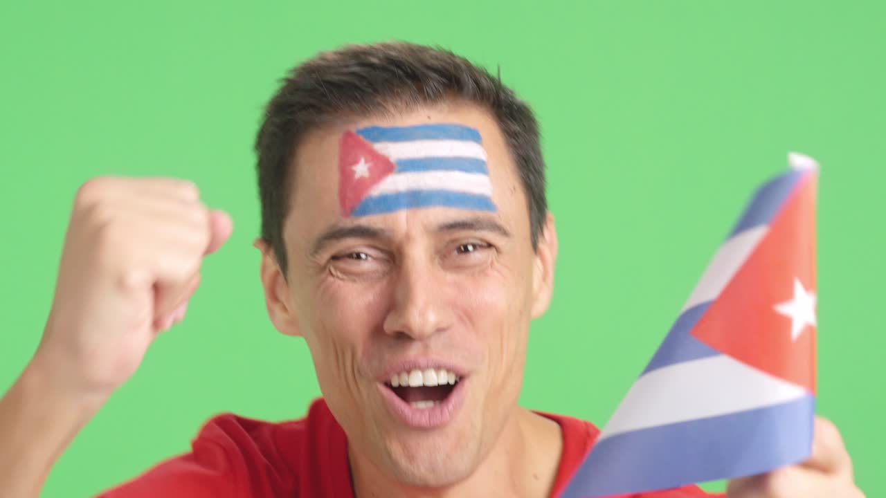 Close up of a man supporting cuban team