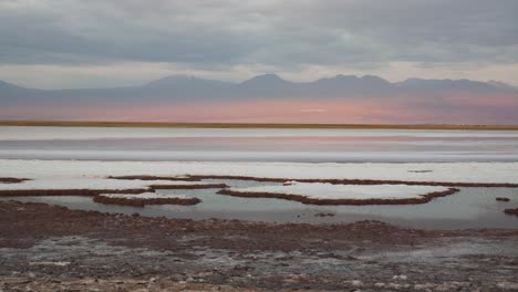 chile atacama desert salt islands in the lagoon at sunset