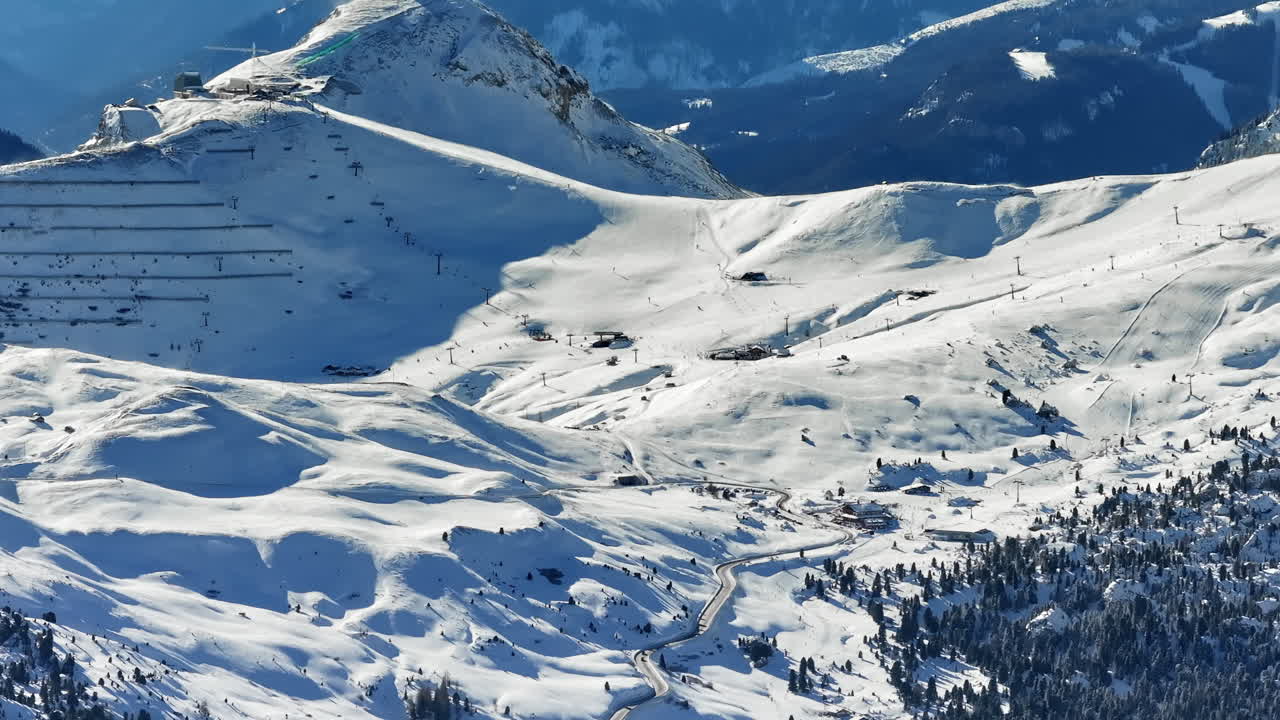 Aerial drone view of the Gardena Pass high mountain pass in the Dolomites, Italy