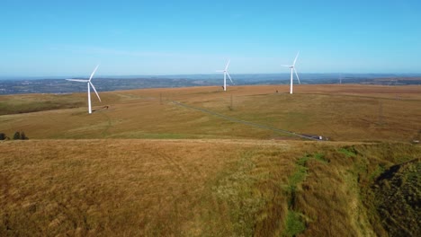 aerial view of wind turbines in a rural landscape