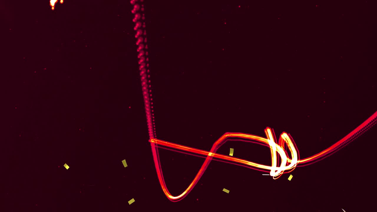 오렌지색 네온 빛의 흔적과 함께 떨어지는 금색 콘페티의 애니메이션