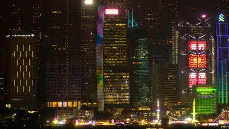 hong kong - 19 march 2025 : hong kong central city skyline filmed from across the harbour in kowloon with all the skyscrapers lit up at night advertisements
