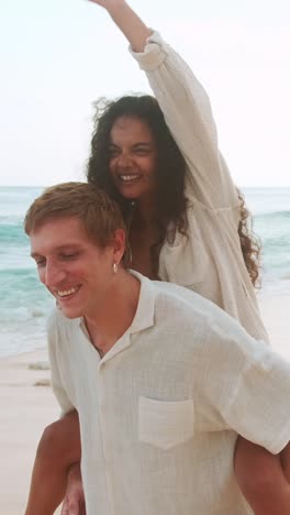 couple enjoys beach day with laughter and joy on sunny shore