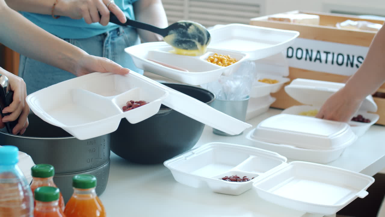 Volunteers Preparing and Distributing Food Donations