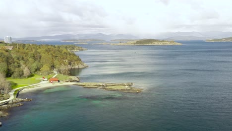 stavanger city seaside. drone aerial view of green coast of old capitol of norway on spring sunlight