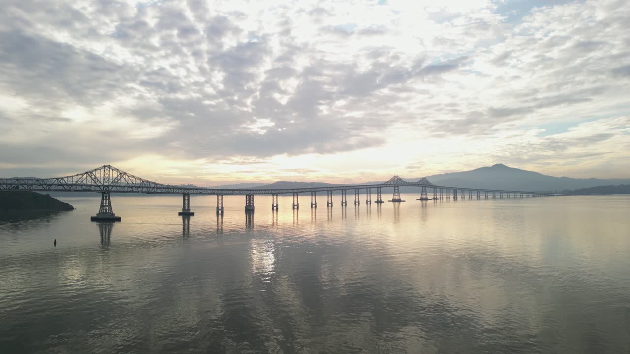 Angled aerial full view pullsback from Richmond Bridge from Point Molate Beach Richmond California USA