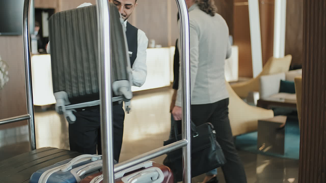 Bellboy Carrying Luggage in Hotel