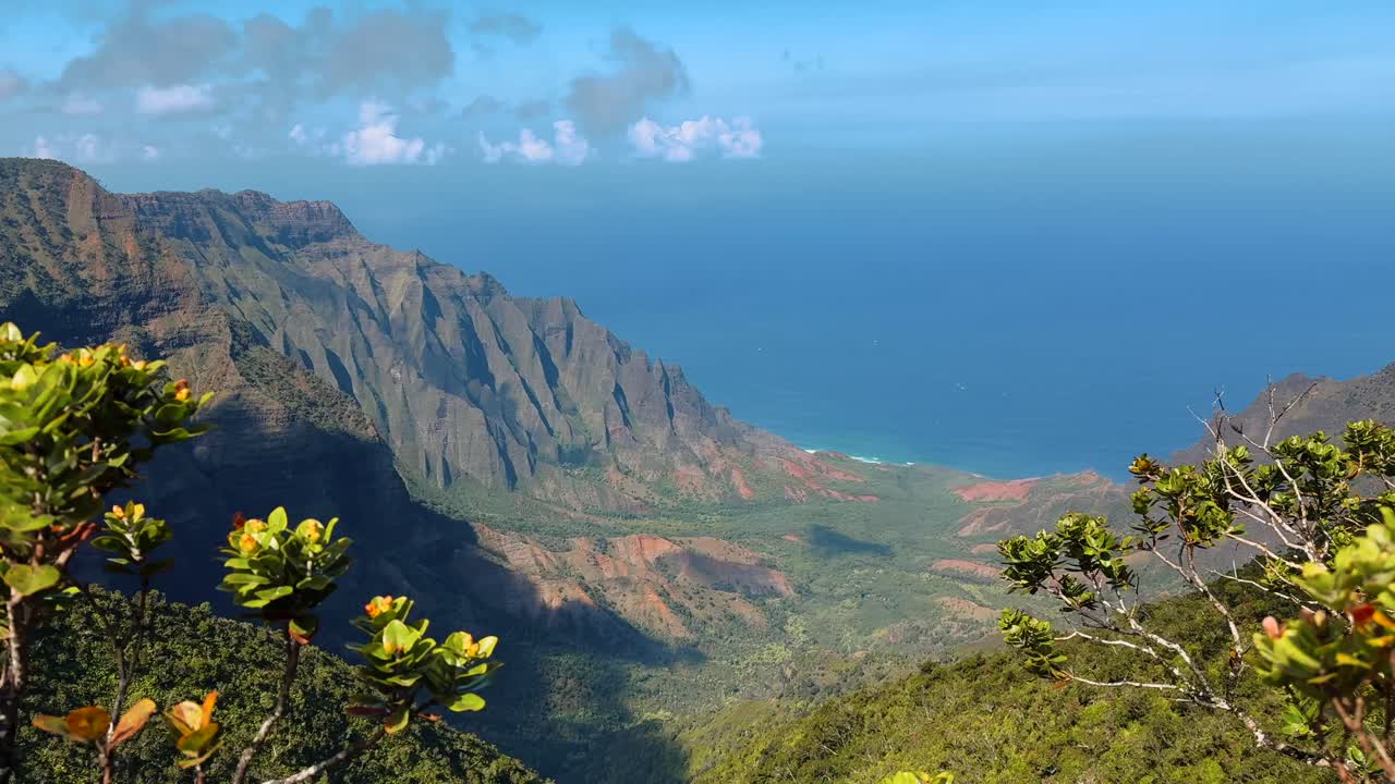Soar over the wild and beautiful shoreline of Hawaii’s Na Pali Coast with cinematic drone footage, showcasing its dramatic cliffs, lush valleys, and turquoise waters.