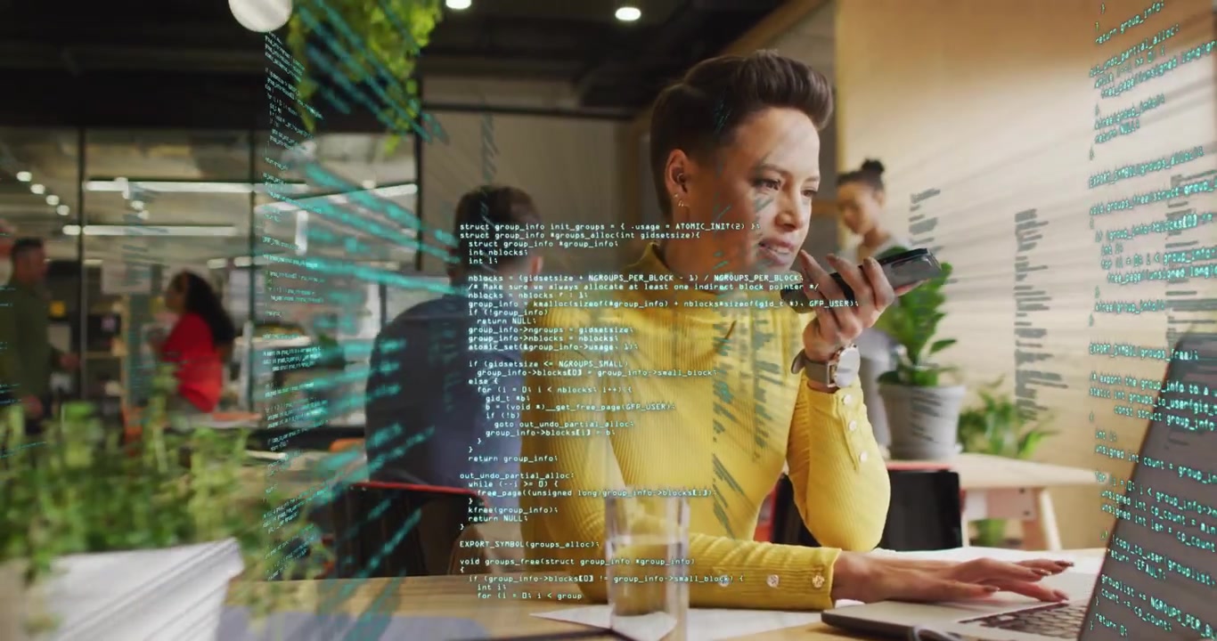 Software engineer picking up voice device speaking commands and typing keys generating code tunnel
