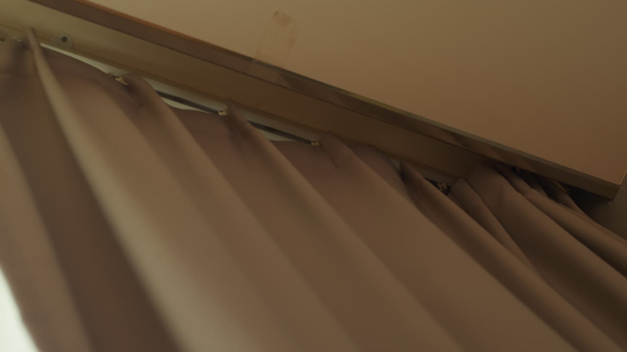 Thoroughly examine curtain hardware and fabric. Carefully review hotel curtain hardware and fabric details. Evaluate components and materials of hotel drape fixtures carefully and thoroughly