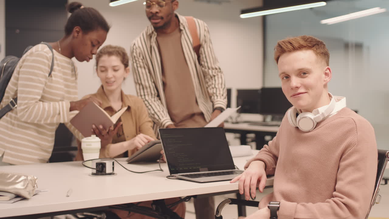 Programmer Writing Code on Laptop