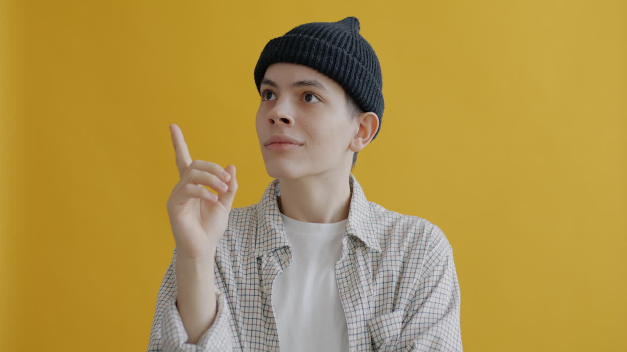 Teenager Pointing Up