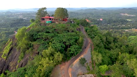 biker moving down the hill of narahari parvatha hill temple