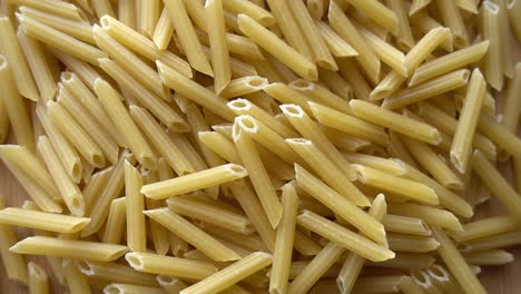 pennette pasta in rotation background