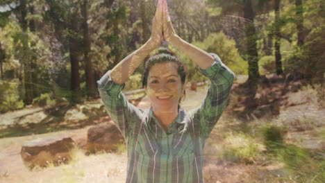 woman doing yoga in  the wilderness