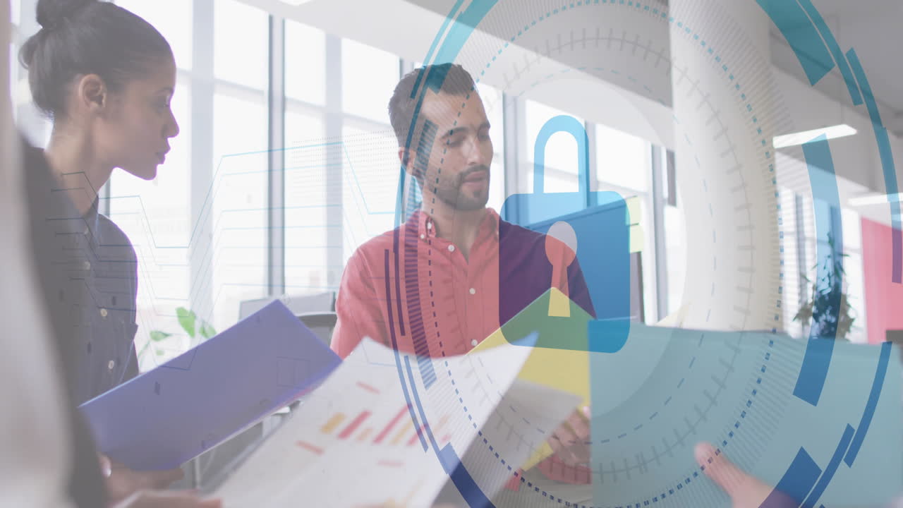 Two colleagues discussing data protection in open-plan office, featuring padlock HUD and charts