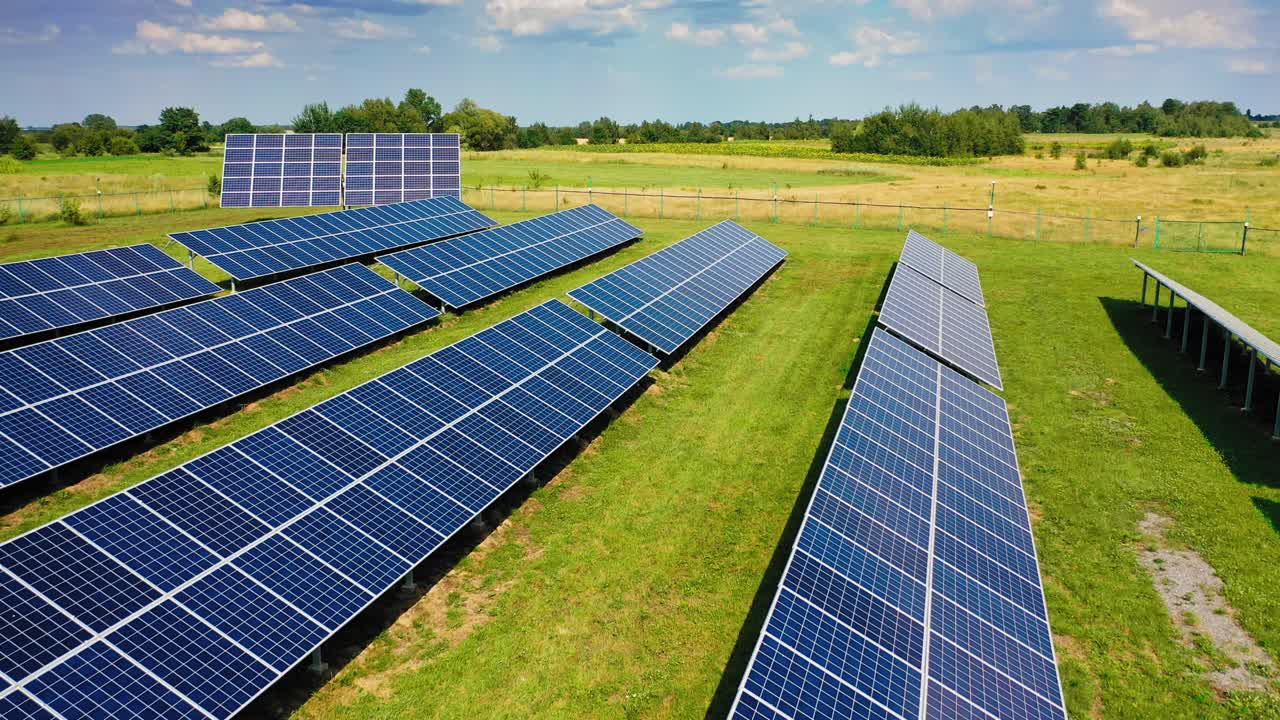 Alternative energy, view of solar panels in field. Solar energy at solar cell panels in a farm with sun lighting to create the clean electric power.