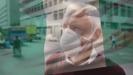 animation of flag of italy waving over man wearing face mask during covid 19 pandemic