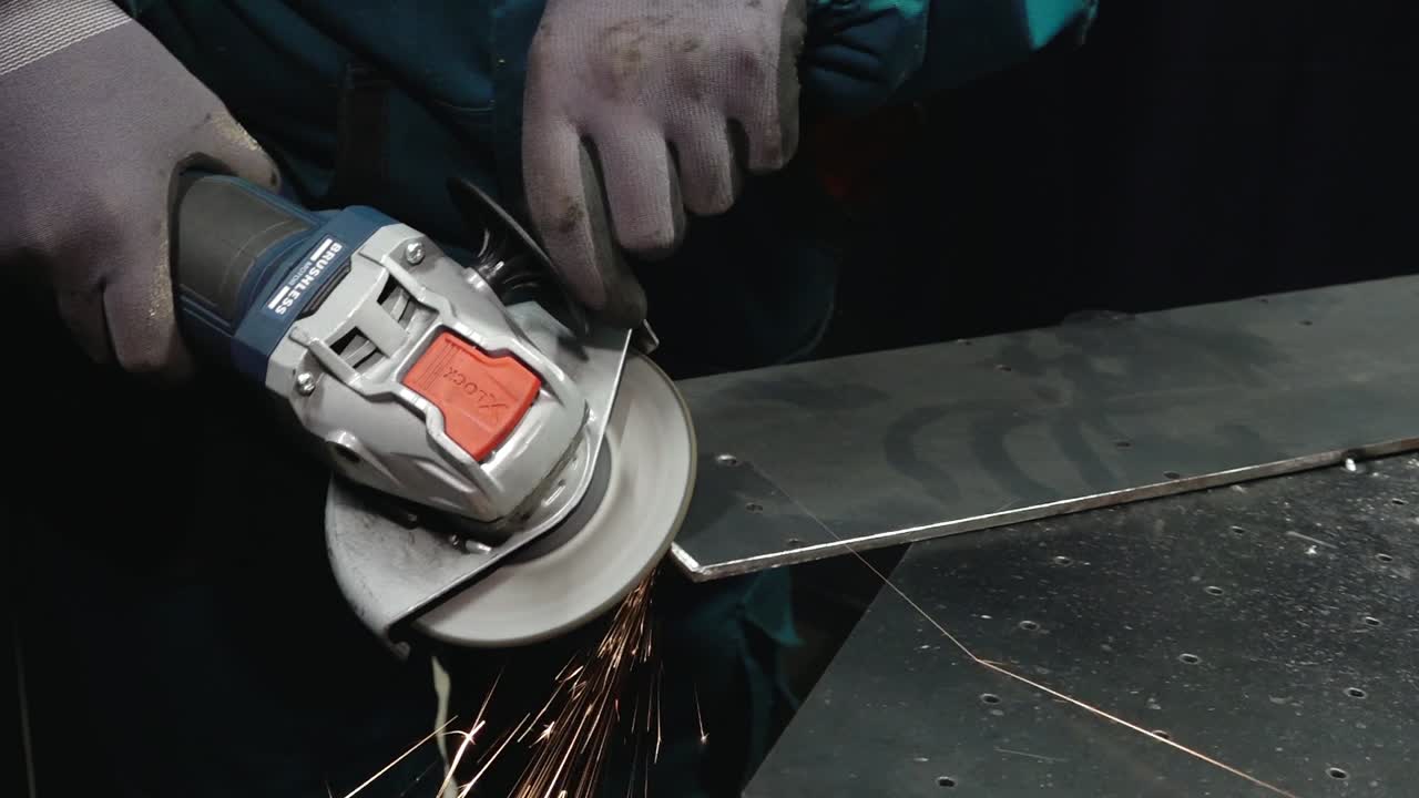 Close-up of a grinding wheel cutting or shaping a metal surface, producing vibrant sparks. A powerful depiction of industrial work and precision.