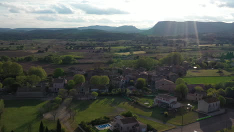 Village-of-Campagne-south-of-France-Herault-vineyards-and-houses-aerial-drone