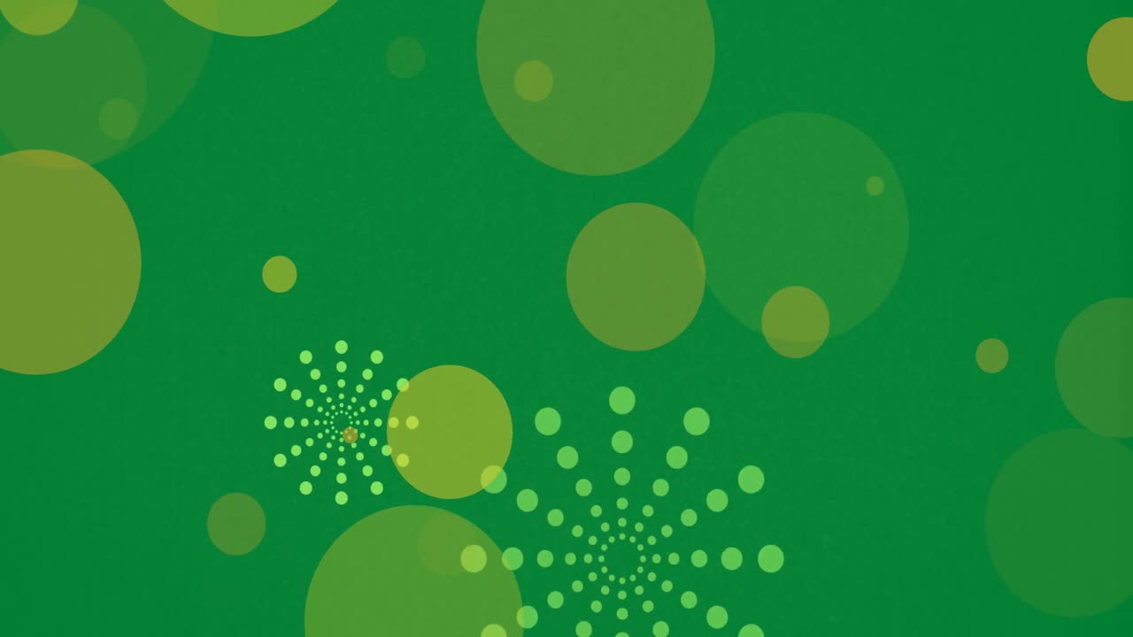 Animazione di fuochi d'artificio verdi di Capodanno e macchie di luce bokeh su sfondo verde.