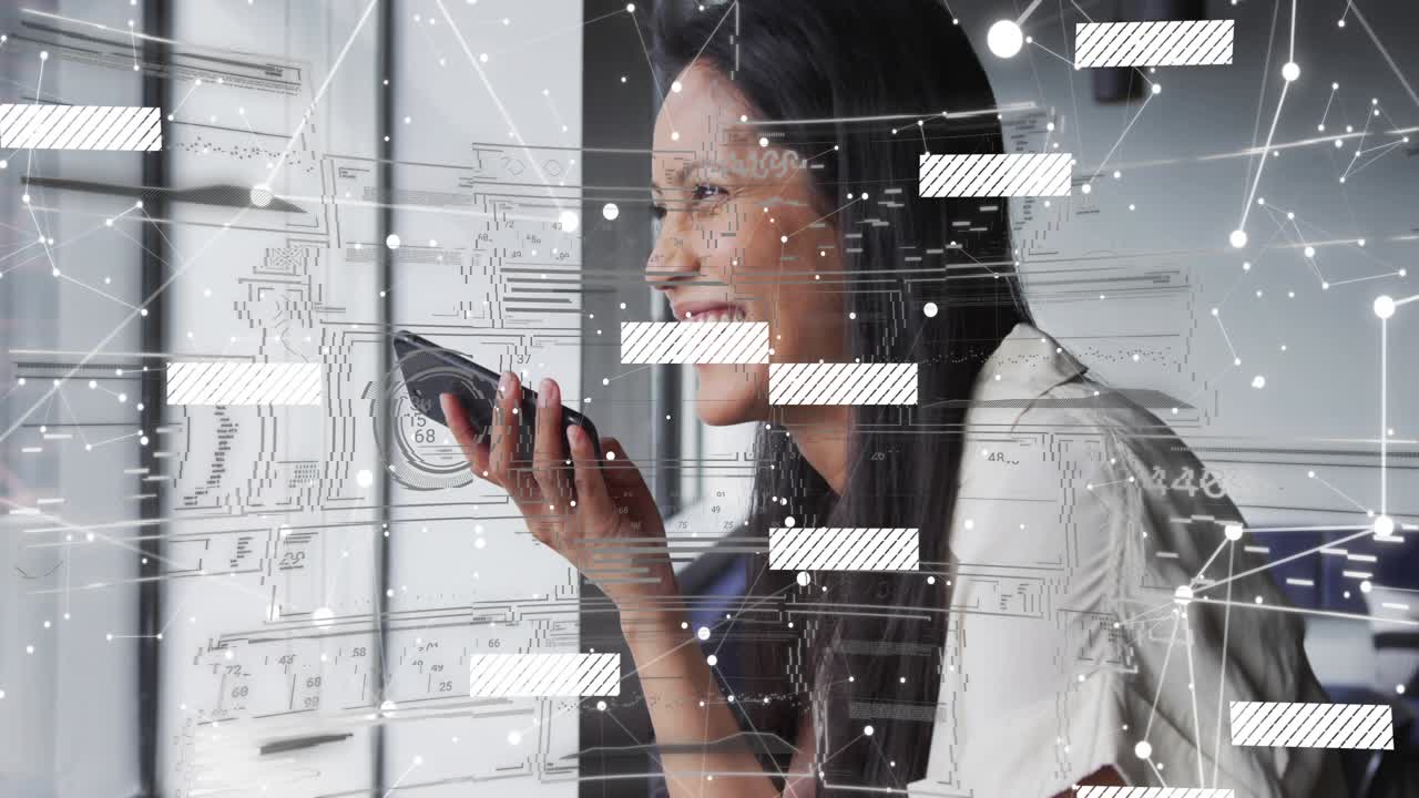 Woman lifting smartphone, speaking for business call in office, moving nodes partly hiding face