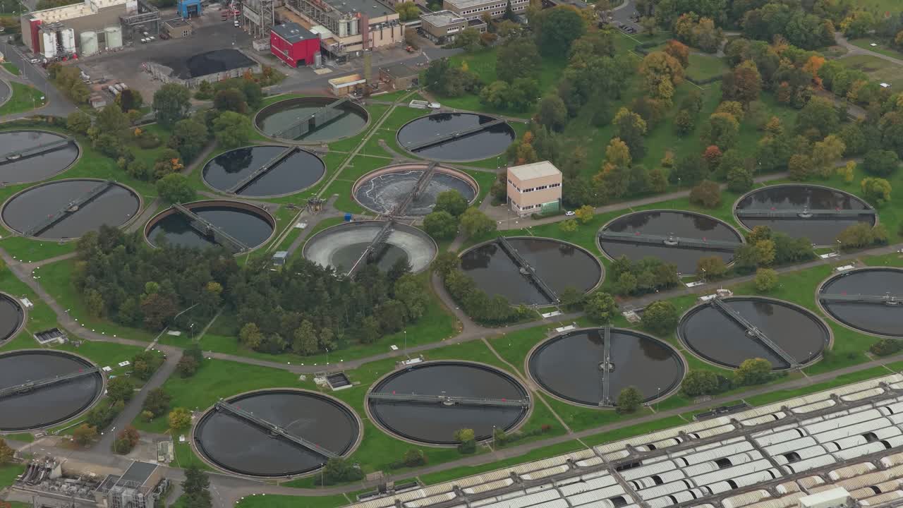 Aerial View of a Large Wastewater Treatment Plant with Circular Tanks