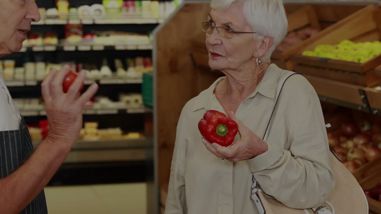 Grocery clerk asking about tomato buyer checking red pepper charts rising over produce showing cost