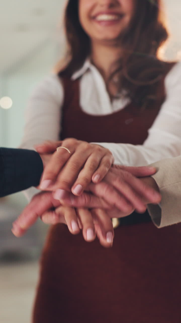 Diverse Business Team Stacks Hands in Unity and Collaboration